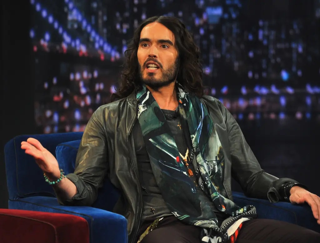 Woman who claims Russell Brand forcefully had his way with her says she begged him to stop
