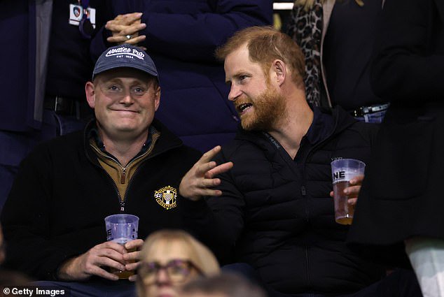 Prince Harry booed by fans as he enjoys a beer at rugby match on first solo public social outing since returning to the UK