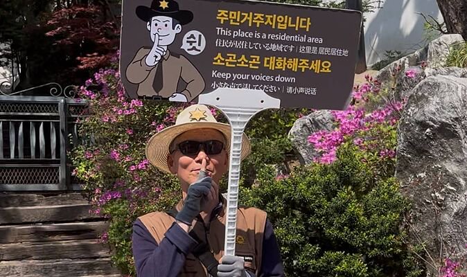 Furious locals are hiring private police to make tourists shut up