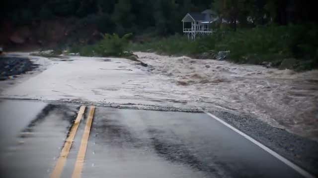 North Carolina flooding: Isaias remnants trigger rescues, landslides
