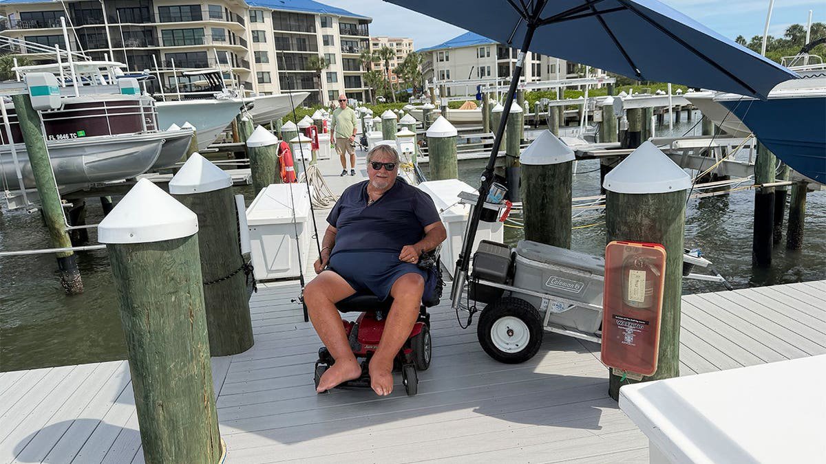 Hero deputy rescues wheelchair-bound grandfather who fell into shark-infested waterway