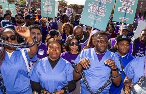 Immigration Reform: UK Migrant Workers Wear Chains In Protest Against Visa Changes