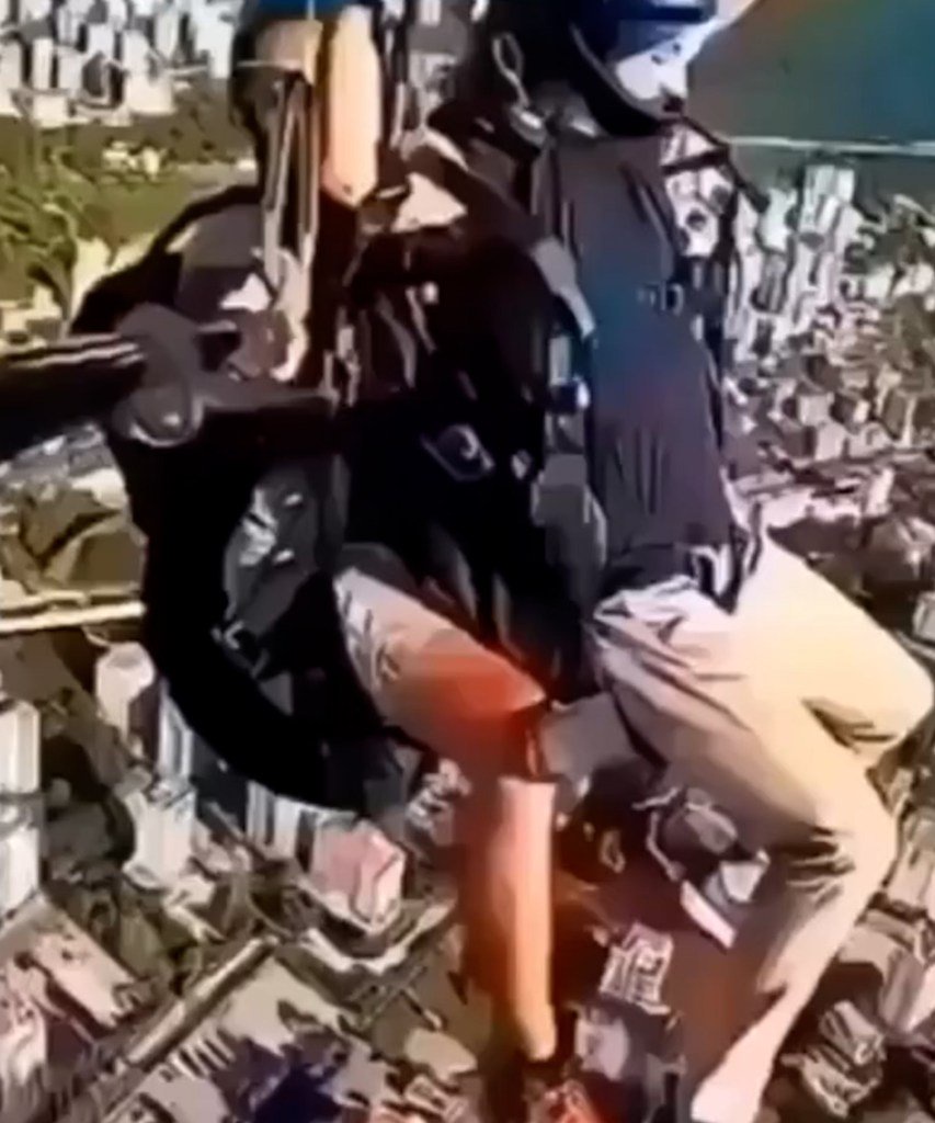 Horror moment tourist slips out of harness on tandem paragliding flight & plunges to his death