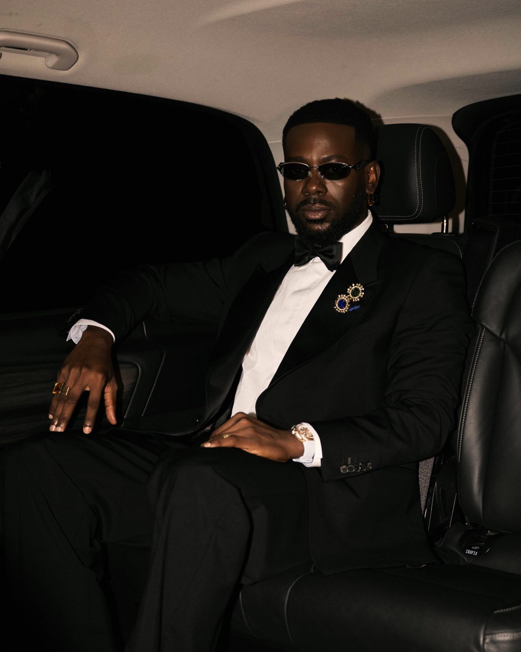 Adekunle Gold Brings Black-Tie Style & Afrobeats to the Ballon d’Or
