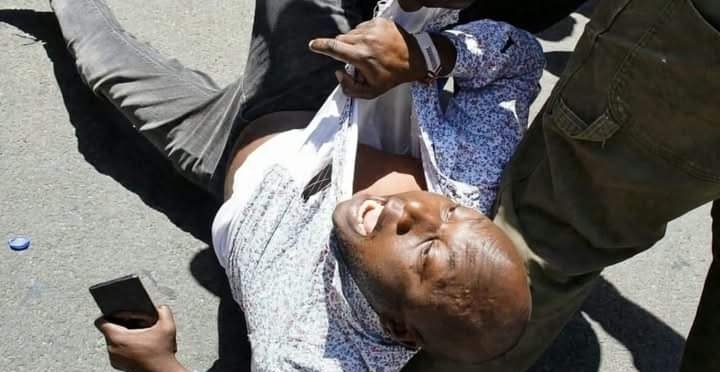 Broad Daylight Drama as Prominent Figure Is Bundled Into a Car While Bystanders Watch Helplessly