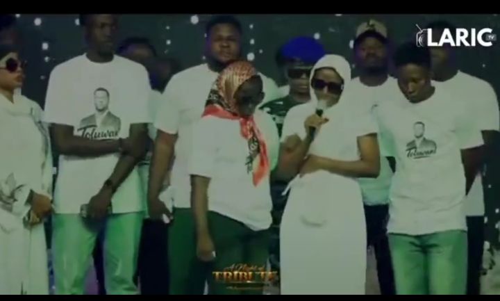 Don’t Forget The Children & I — Toluwanisings’ Wife Breaks Down At Husband’s Night Of Tribute