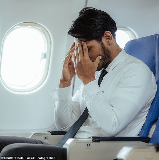 Woman sparks debate as she confesses to poking airplane seatmate with EARRING after he invaded her space