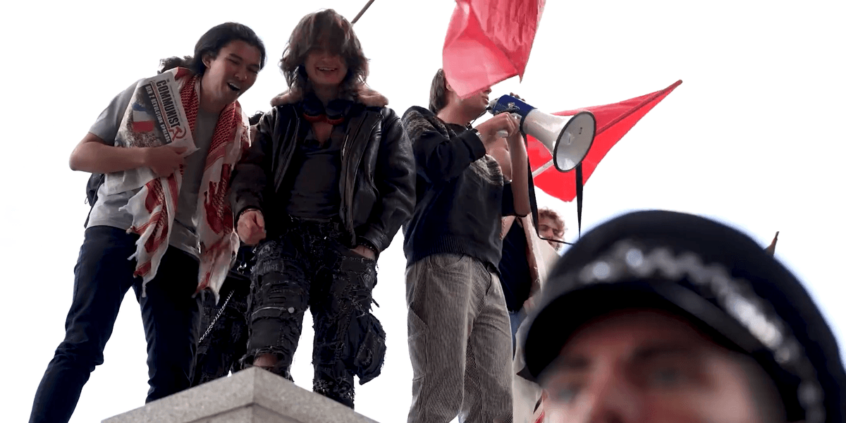 Communist protesters scale Battle of Britain memorial during London pro-Palestine march