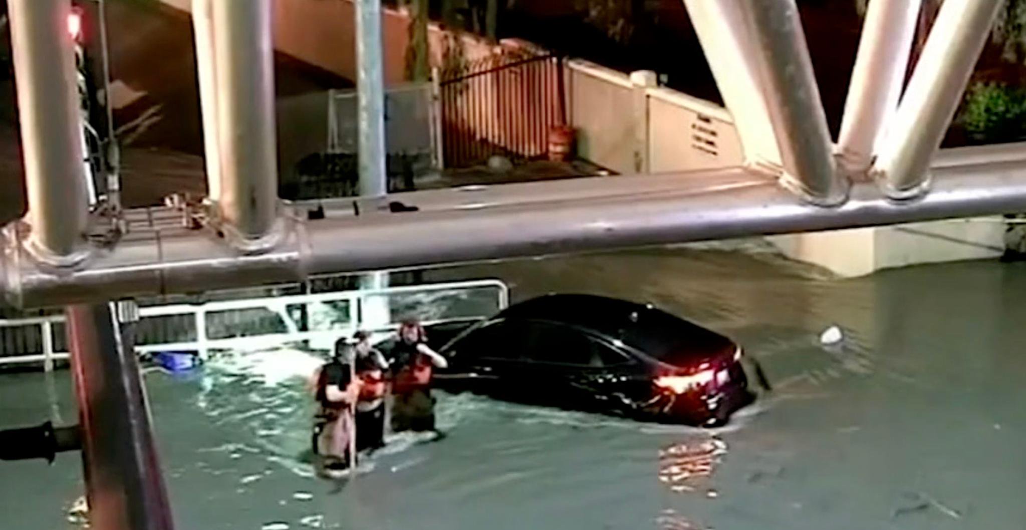 Dramatic moment driver trapped on top of her car after Tropical Storm Rachel hit Las Vegas
