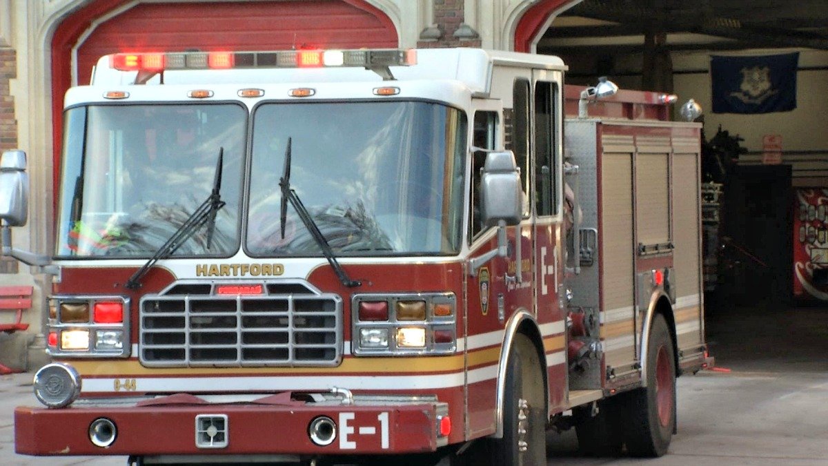 2 extricated from vehicle after crashing into tree in Hartford