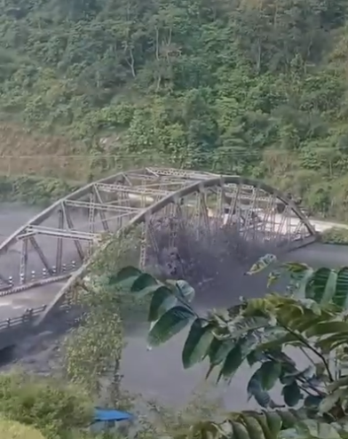 Dramatic moment Nepal flash floods wipe out entire bridge as rescuers scramble to find 5 missing – weeks after tragedy