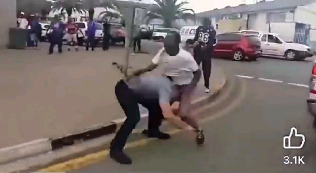 White Man Overpowers Two Black Men During Filmed Confrontation