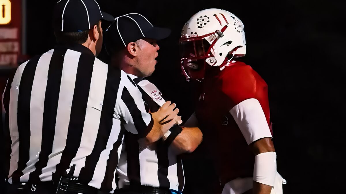 High School Referee Suspended Indefinitely After Viral Clip Showed Him Getting Into It With A Player In The End Zone [VIDEO]