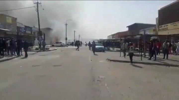 Footage shows a man carrying a military style rifle openly on a South African street
