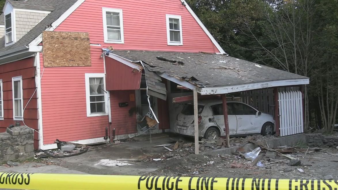 Vehicle crashes into 2 Ellsworth homes, killing passenger