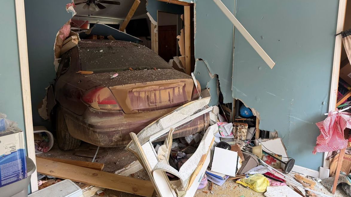 Family of 8 displaced after car crashes into Bedford County home