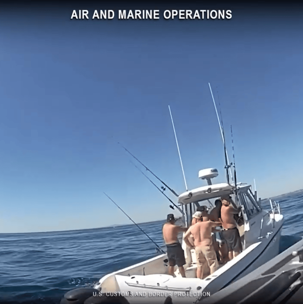 Moment boat smuggling 14 illegal immigrants intercepted off Newport Beach in latest federal takedown