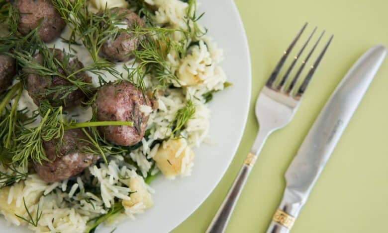 Swedish meatballs with dill, served over celery and spinach rice