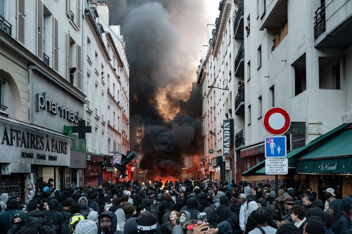France night of chaos sparked by rioters taking advantage of protests – buildings on fire and windows smashed