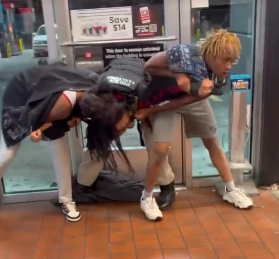Shocking video shows 2 women leap on top off-duty cop at gas station — before trying to snatch his gun