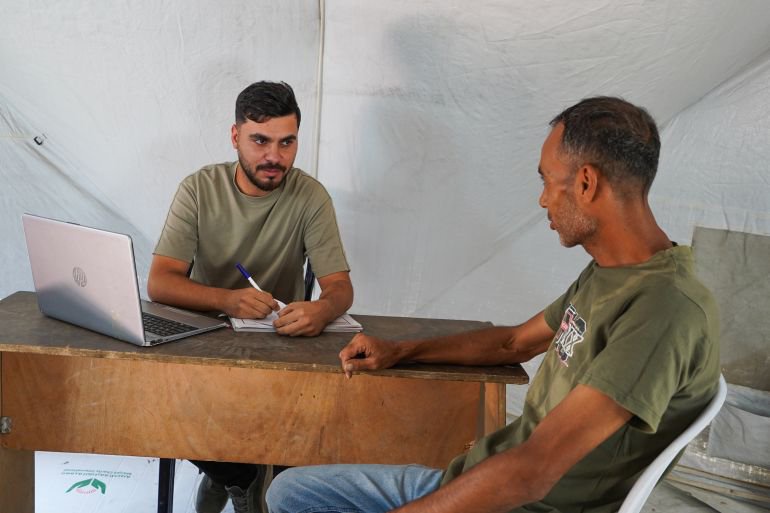 When streets become a workplace: Gaza workers convert tents into offices