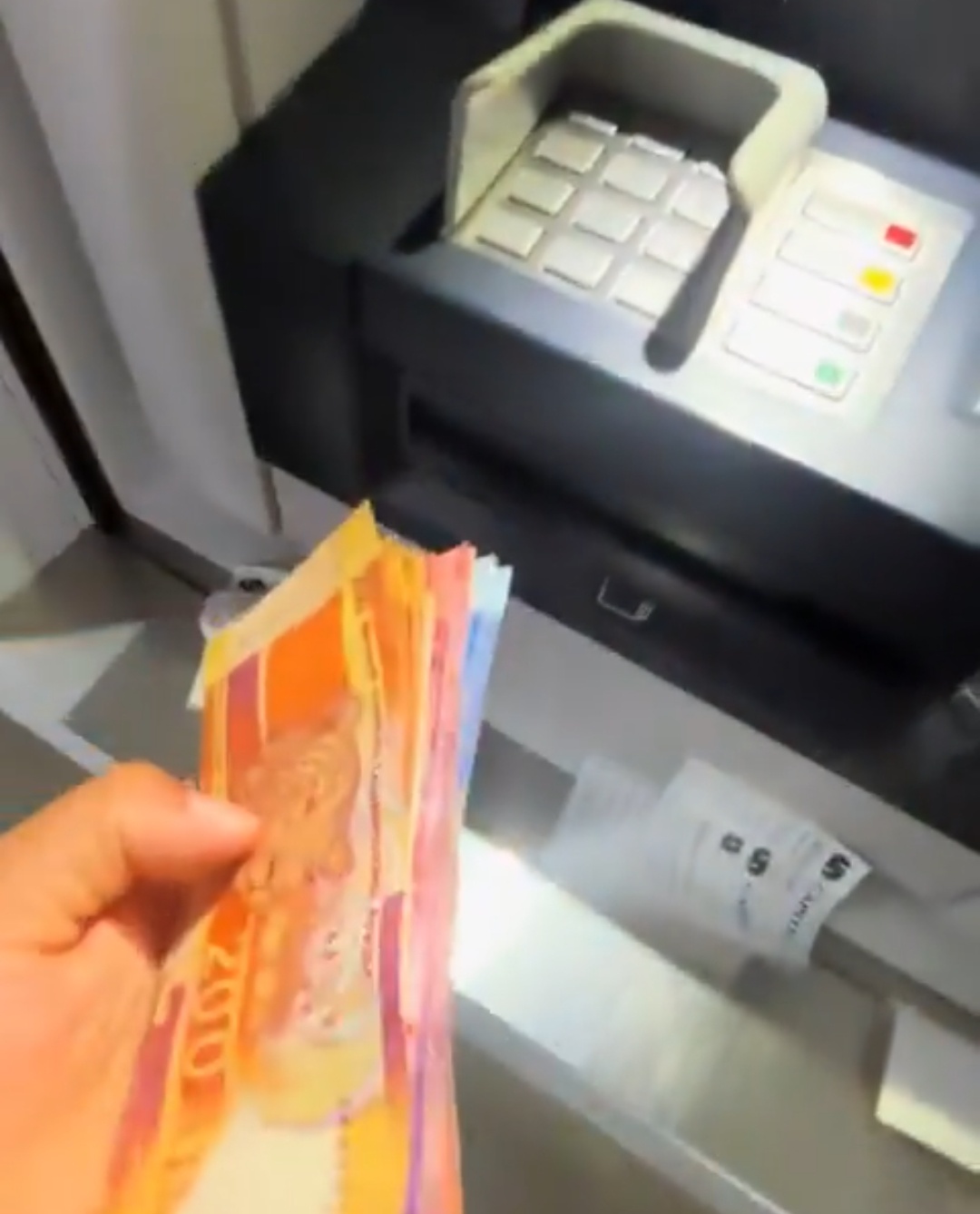 Capitec ATM appears to pay out bundles of cash as people grab the money
